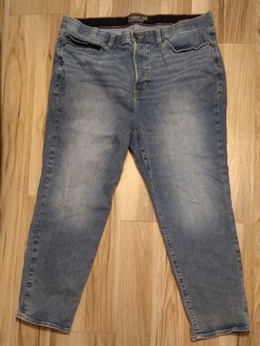torrid Light Blue Denim Boot Cut Jeans with Black Waistband Detail